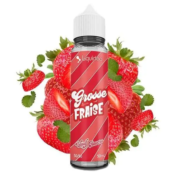E-liquide Grosse Fraise de Liquideo avec fraises fraîches, flacon et feuilles vertes