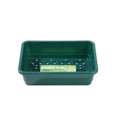 Petit bac à graines vert avec trous